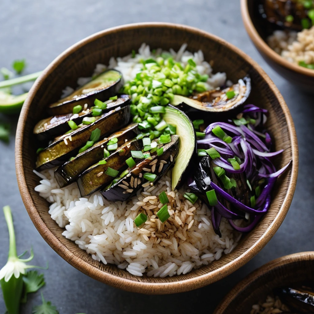 Steamed rice topped with roasted eggplant slices, green onions, and a drizzle of miso sauce in a wooden bowl.
